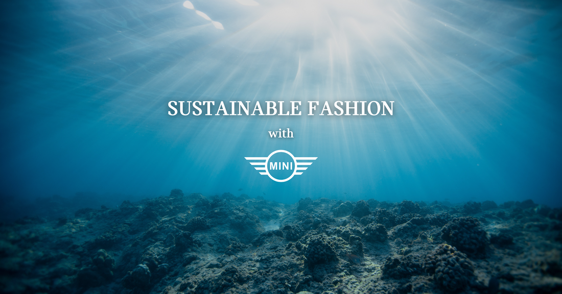 Underwater scene with rays of light highlighting sustainable fashion with MINI logo over ocean floor