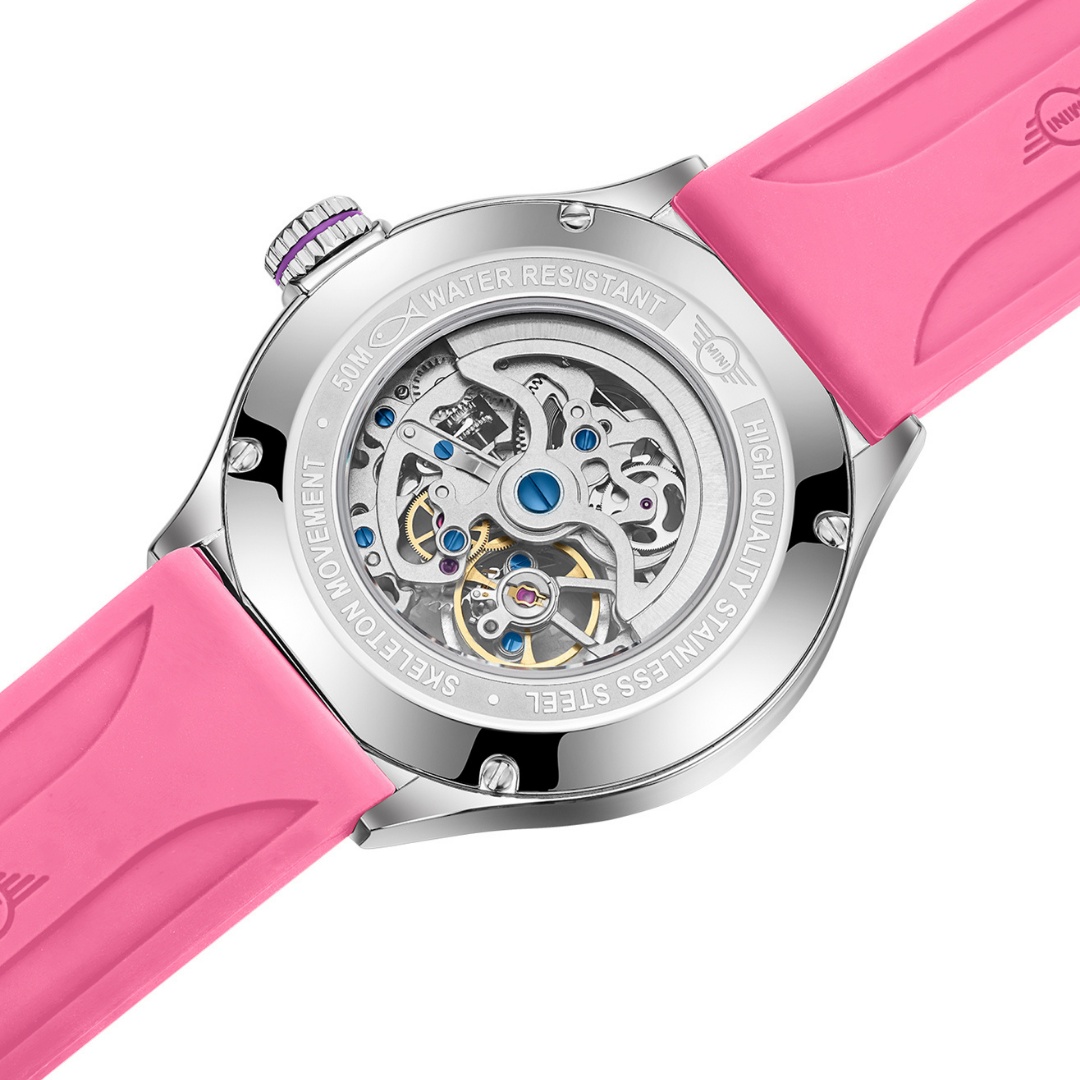 MINI Cooper watch featuring Skeleton Silicone Strap - Pink with visible skeleton movement and stainless steel back
